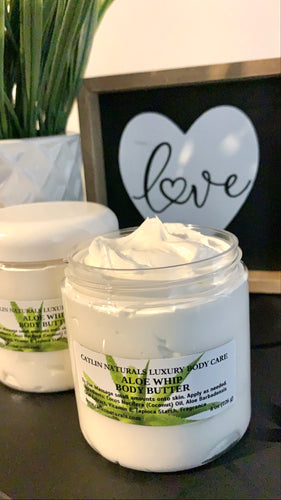 clear jar of whipped body butter with lid off , clear jar of whipped body butter with lid on