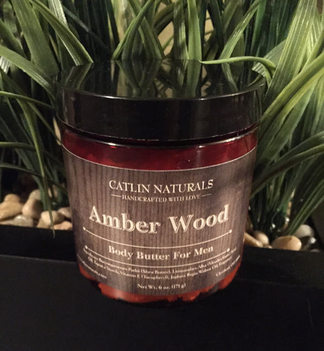 amber color jar, black lid, brown label