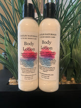Load image into Gallery viewer, showing two large clear bottle of lotion with black top
