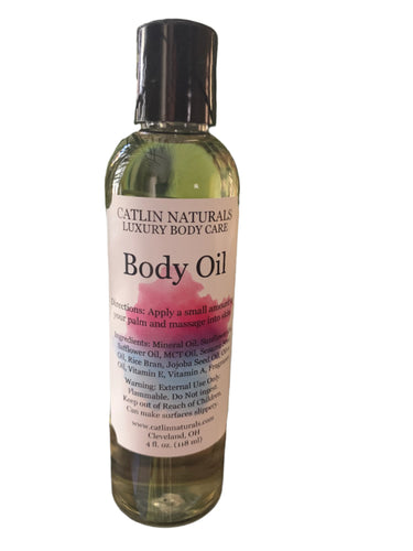 clear bottle of body oil