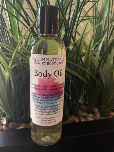 clear bottle of body oil